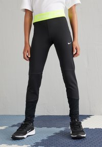 Nike Performance - LEGGINGS UNISEX - Legging (type pantalon) - black/volt/white Image miniature 1