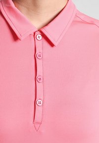 K-SWISS Sportovní tričko - coral