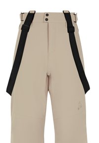 Pantalon beige avec bretelles noires ajustables, fermeture double bouton et un logo sur la cuisse droite.