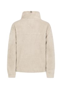 Fleece-Pullover in Cremefarbe mit hohem Kragen, strukturierter Oberfläche und langen Ärmeln. Verfügt über ein kleines Logo am Halsausschnitt und keine Verschlüsse.