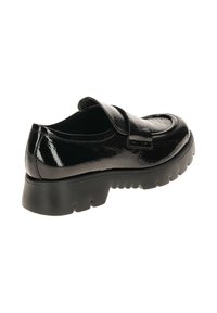 Zwarte gepatineerde leren loafers met een chunky zool en een ronde neus. Heeft een gladde textuur en een band over de wreef.