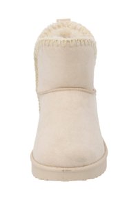 Botines de ante beige hasta el tobillo con un interior suave y texturizado y una suela de goma plana. Presentan detalles cosidos a lo largo del borde superior.
