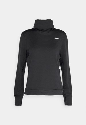 Top negro de manga larga con cuello alto, hecho de una tela texturada, con un diseño ajustado y el logo de Nike en blanco en el lado izquierdo del pecho.