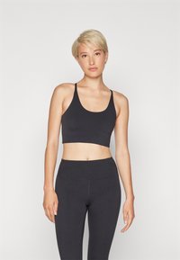 Girlfriend Collective FLOAT CLEO HALTER BRA - Sportski grudnjak s blagom potporom - black