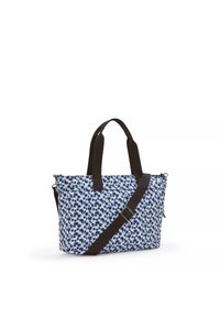 Blue and white tote bag with a spotted pattern, featuring dark brown straps and an adjustable shoulder strap. Material appears durable.