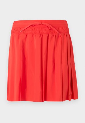 Jupe plissée rouge avec taille élastique et cordon de serrage, longueur mi-longue, en tissu léger.