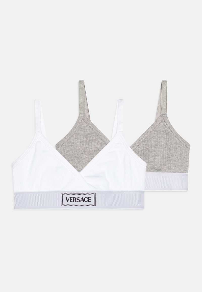 To bralette, en hvit og en lys grå, med et kryss-design foran og elastisk bånd med Versace-logo. Laget av bomullsblanding.
