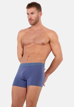 Herren blaue Boxershorts aus weichem Material, mit einem grauen elastischen Bund mit "HOM"-Markenlogo. Klassisches Design mit figurnahem Schnitt.