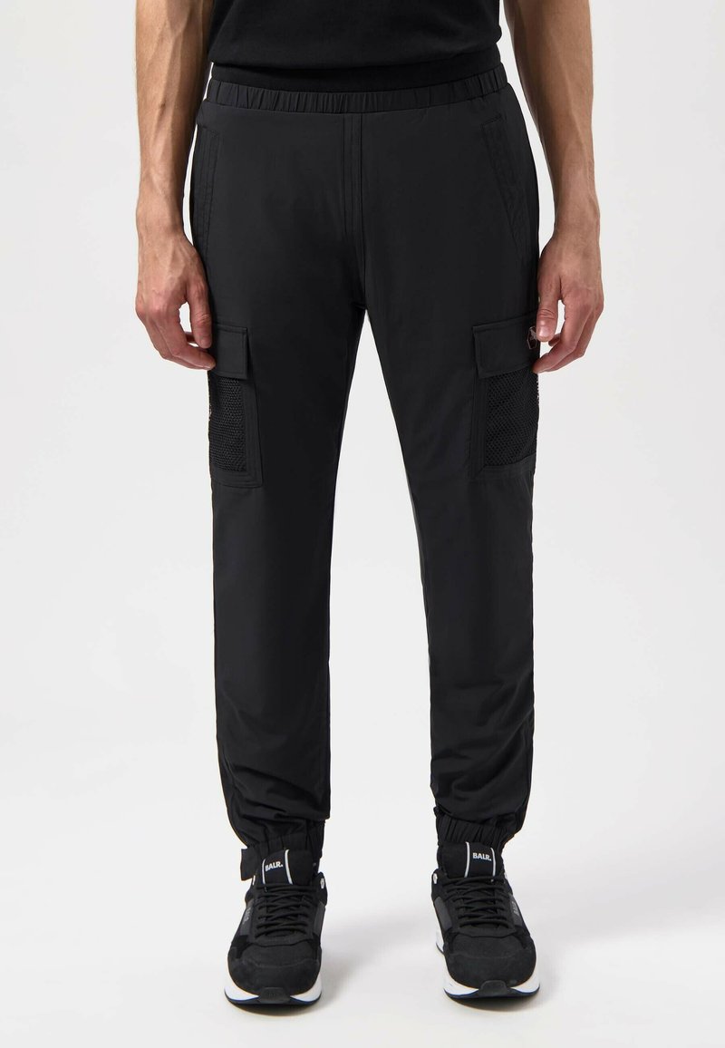 Zwarte cargobroek met elastische tailleband, mesh zakken op de dijen, taps toelopend design en elastische boorden. Textuurstof.