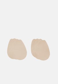 Nude silicone pads in a teardrop shape. Six smooth, flexible pieces with rounded edges, designed for comfort and discreet wear.