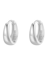 Srebrne kolczyki nauszników z gładką, wypolerowaną powierzchnią i delikatnym zaokrągleniem. Wygrawerowane "S925" po wewnętrznej stronie.