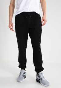 Urban Classics - BASIC SWEATPANTS - Treningo apatinė dalis - black Miniatiūros vaizdas 1