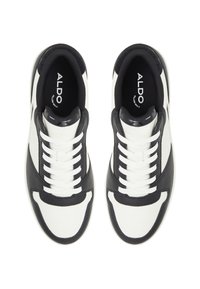 Leather sneakers featuring a black and white design, textured accents, and white laces. Interior shows "ALDO" branding. Rounded toe shape.