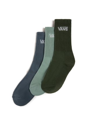 Drei Paar gerippte Socken in Dunkelblau, Hellgrün und Dunkelgrün, jeweils mit dem weißen "VANS"-Logo am Bündchen.