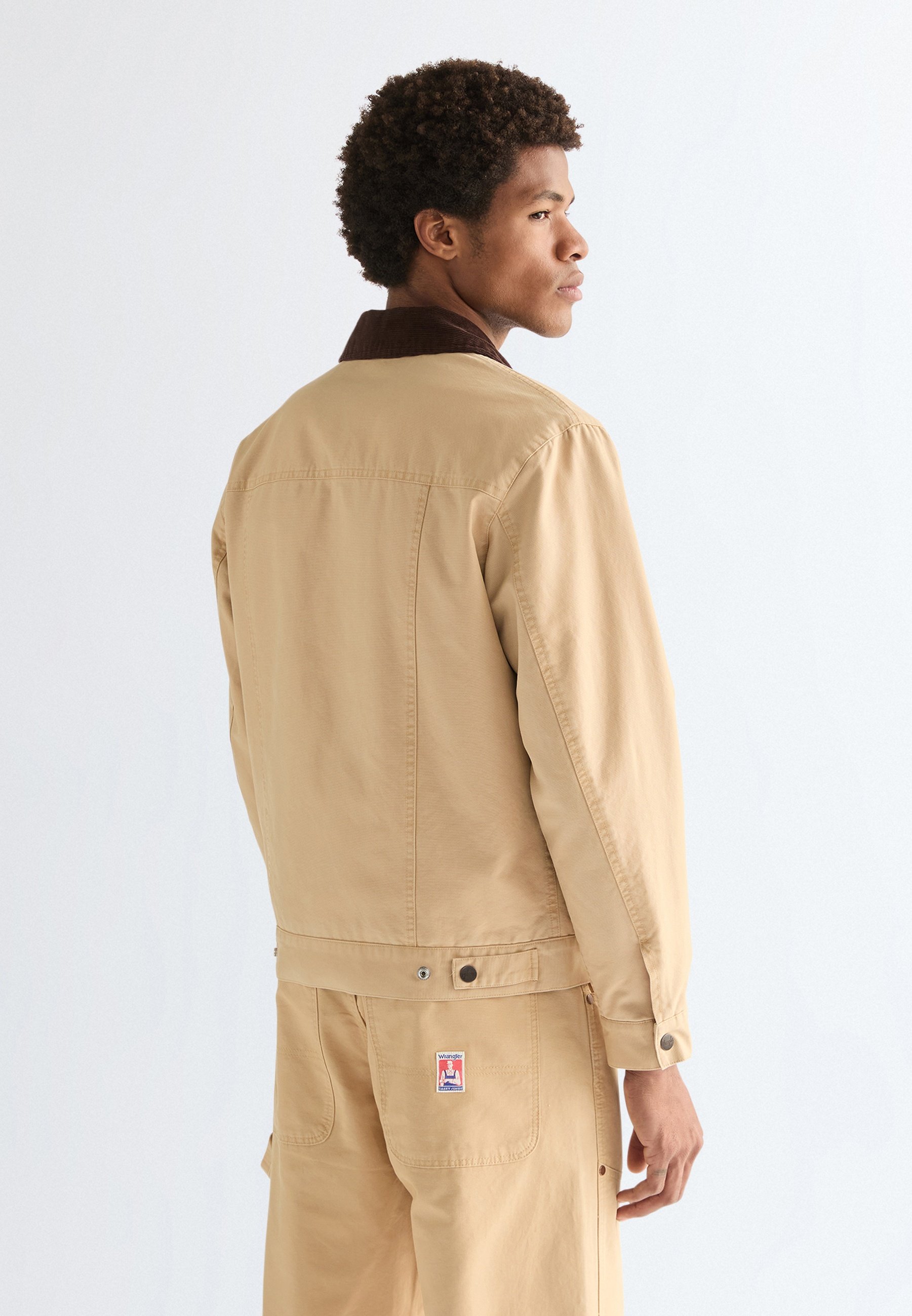Wrangler TRANSITIONAL JACKET - Light jacket - golden-coloured