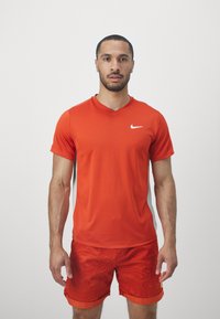 Nike Performance TOP - Camiseta deportiva - rust factor/pink quartz/white