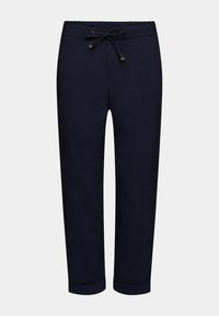 Pantalon bleu marine fuselé avec taille élastique, cordon de serrage, poches latérales et ourlets repliés sur un fond uni.