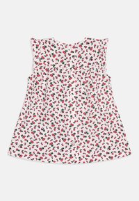 Top senza maniche floreale bianco con motivo di ciliegie rosse e foglie verdi. Presenta spalle arricciate e chiusura posteriore con bottoni.