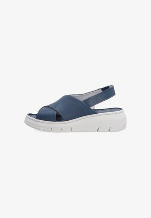 Mørkeblå lædersandaler med åben tå og slingback-design. Tykt hvidt sål med riller for godt greb og komfort.