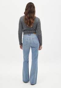 NA-KD Flared jeans - light blue