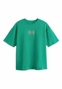 T-shirt vert manches courtes avec un col rond et « MIAMI » imprimé en lettres claires au centre de la poitrine.
