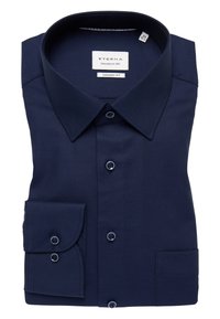 Navyblaues Langarmhemd mit strukturiertem Muster. Knopfleiste vorne, klassischer Kragen und eine einzelne Brusttasche. Komfortable Passform.
