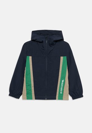 Marineblaue Kapuzenjacke mit beigen und grünen vertikalen Streifen an den Seiten, Reißverschluss vorne, elastischen Bündchen und weißem Quiksilver-Logo vorne.