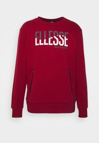 Czerwona bluza z długimi rękawami, okrągłym dekoltem, zamkami z przodu oraz logo 'ELLESSE SPORT' w białym i czarnym kolorze. Miękka tkanina i luźny krój.