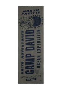 Green fabric towel featuring navy blue text and graphics, including a globe and "CAMP DAVID" branding. Edges are fringed.