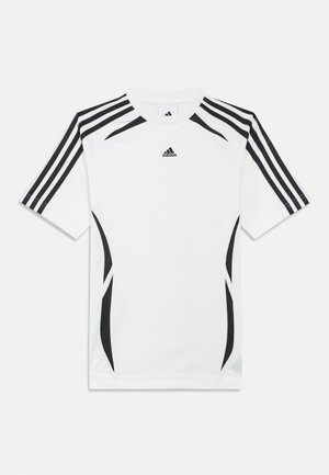 White athletic shirt featuring black accents, three black stripes on shoulders, and Adidas logo on chest. Made of breathable material.