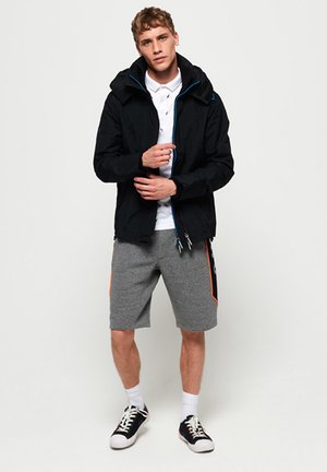 MIT REISSVERSCHLUSS UND KAPUZE - Windbreaker - black