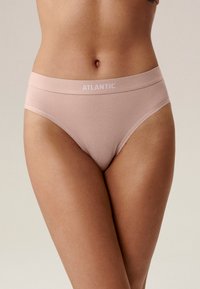 Beżowa bielizna z miękkim elastycznym pasem w nadrukiem "ATLANTIC". Materiał jest gładki, z minimalistycznym wzornictwem i bez widocznych wzorów.