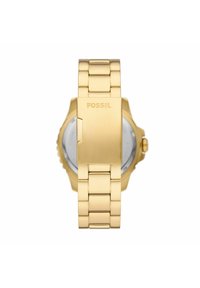 Montre en acier inoxydable doré avec un bracelet en maillons, dotée d'une finition polie, du logo Fossil et d'un cadran rond.