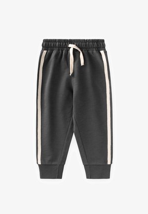 Pantalones deportivos para niños pequeños en gris oscuro con cintura elástica, cordón beige y rayas laterales beige que se extienden hasta los puños acanalados.