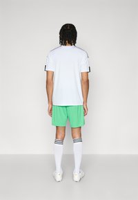 adidas Performance MANCHESTER UNITED THIRD GOALKEEPER SHORTS - Klub merchandise - semi screaming green