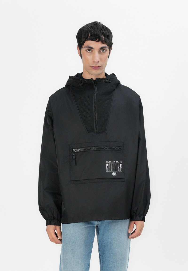 Versace Jeans Couture Lichte jas zwart Versace Jeans Couture Lichte jas zwart