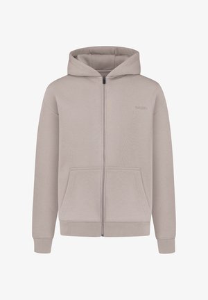 Sudadera con cremallera de color beige claro, material de algodón, con bolsillos frontales, puños y dobladillo acanalados, diseño con capucha y un pequeño logo en el pecho.