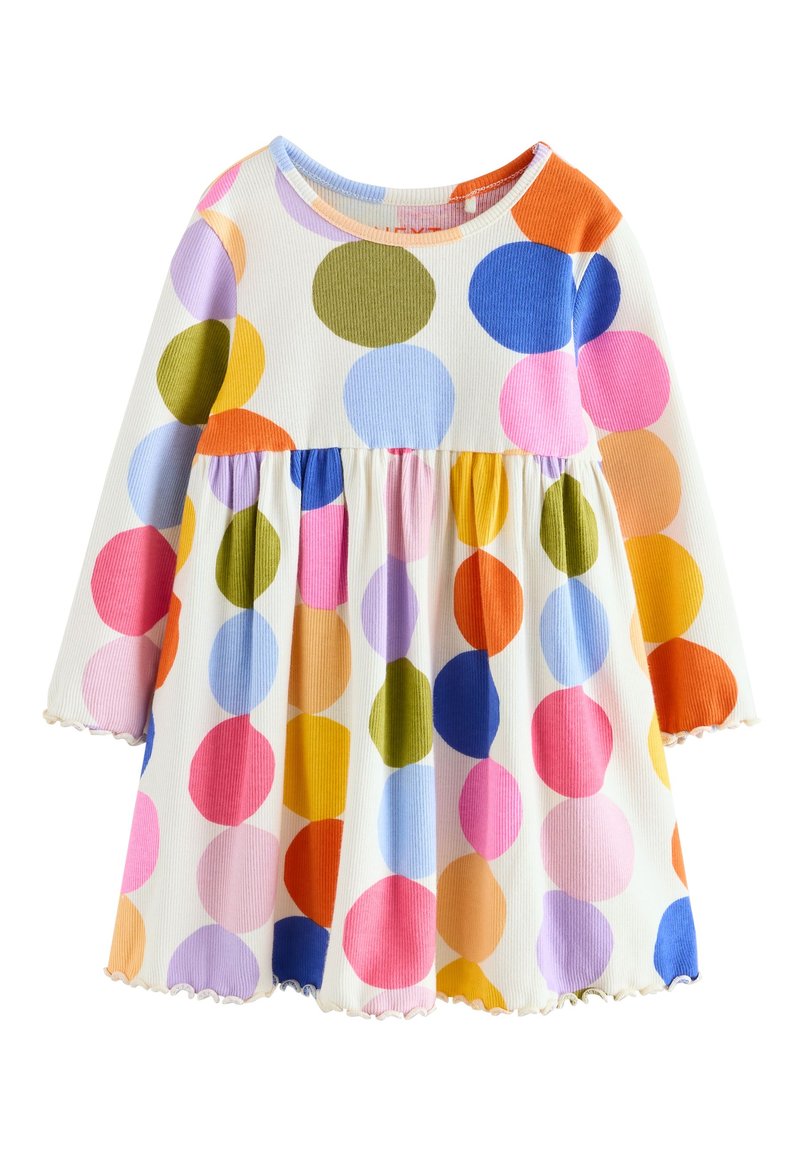 Robe à manches longues avec des pois colorés en rose, bleu, orange, vert et jaune sur un tissu côtelé blanc, dotée d'une jupe évasée et d'un ourlet festonné.