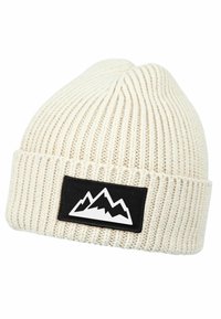Beanie hat in off-white knit material with a ribbed texture. Features a black rectangular patch with a white mountain graphic.