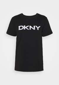 Black cotton t-shirt with short sleeves, featuring a prominent white embroidered "DKNY" logo across the front. Simple crew neck design.