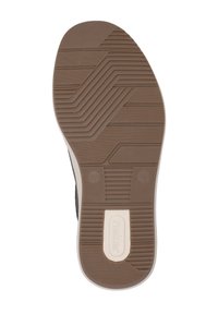 Brown rubber sole with textured patterns, featuring a smooth white accent and branding. The design includes various grooves for traction.