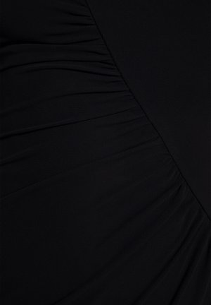 Black dress fabric with gathered texture, featuring diagonal panels. The material is smooth, creating a sleek appearance.
