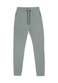 Ljust grå sweatpants med en mjuk textur, elastisk midja, svarta dragsnören och sidofickor. Har diskreta logodetaljer.