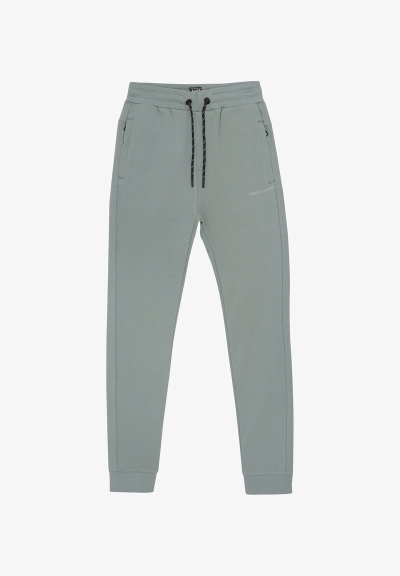 Lichtgrijze sweatpants met een zachte textuur, elastische tailleband, zwarte trekkoorden en zijzakken. Beschikt over subtiele logo-details.