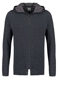 Donkergrijze capuchontrui met ritssluiting en een contrasterende lichtgrijze voering in de capuchon. Voorzien van lange mouwen en een gestructureerde stof met een gladde afwerking.