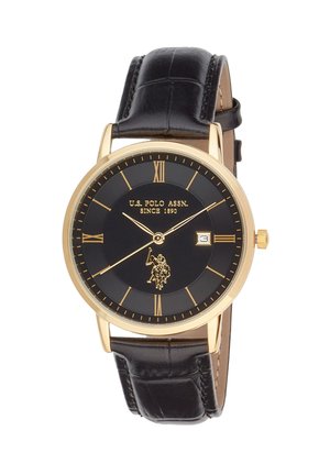 Montre ronde en or avec un bracelet en cuir noir, cadran noir, chiffres romains, affichage de la date et logo U.S. Polo Assn. indiquant 3:40:38.