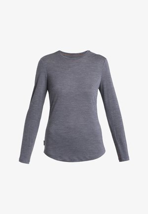 Langermet grå skjorte laget av lett stoff. Har rund hals og buet nederkant. Enkel design med minimal detaljering.