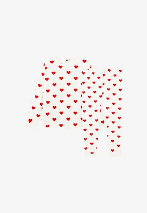 Balti ilgomis rankovėmis viršutiniai drabužiai ir kelnės pižamos komplektas, padengtas tolygiai paskirstytų raudonų širdelių raštu.