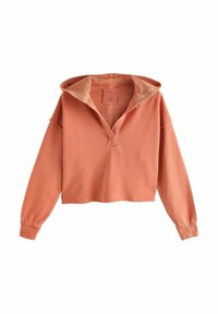 Pullover en coton corail avec une capuche, des manches longues et une coupe décontractée. Présente un col boutonné et des détails d'ourlet brut pour apporter de la texture.