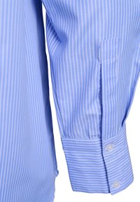 Light blue long-sleeve shirt with white vertical stripes, featuring a buttoned cuff and smooth fabric texture. Reinforced stitching detail visible.